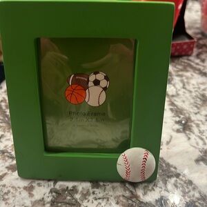 One little small sports frame 🖼️ for that special little someone green in color
